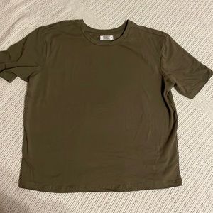 2 shirts, both small. One green, one rusty red. Soft and comfy.